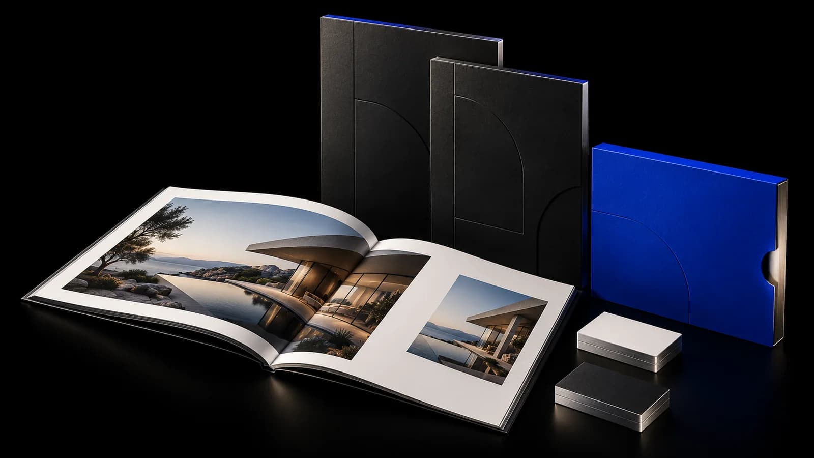 Sculptural blue brand stationery and print materials arranged as an editorial still life
