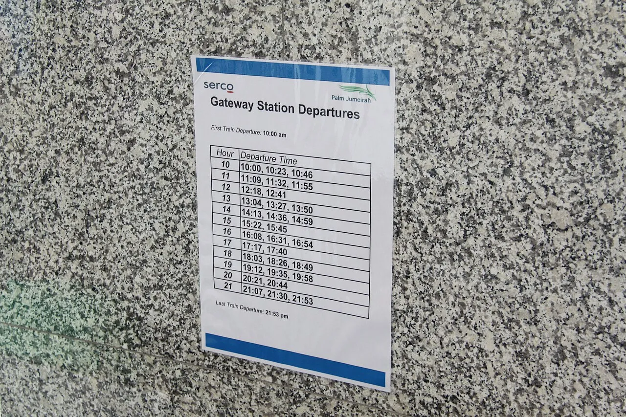 A printed monorail timetable pinned for passengers