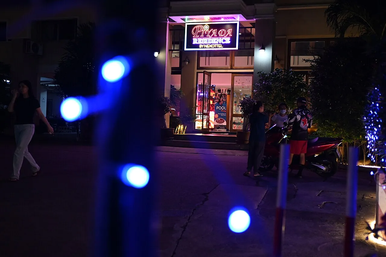 DFC 4706 Neon nights at a cozy Chon Buri bar - soft blue lights lead the way to an inviting glow and late-night chatter